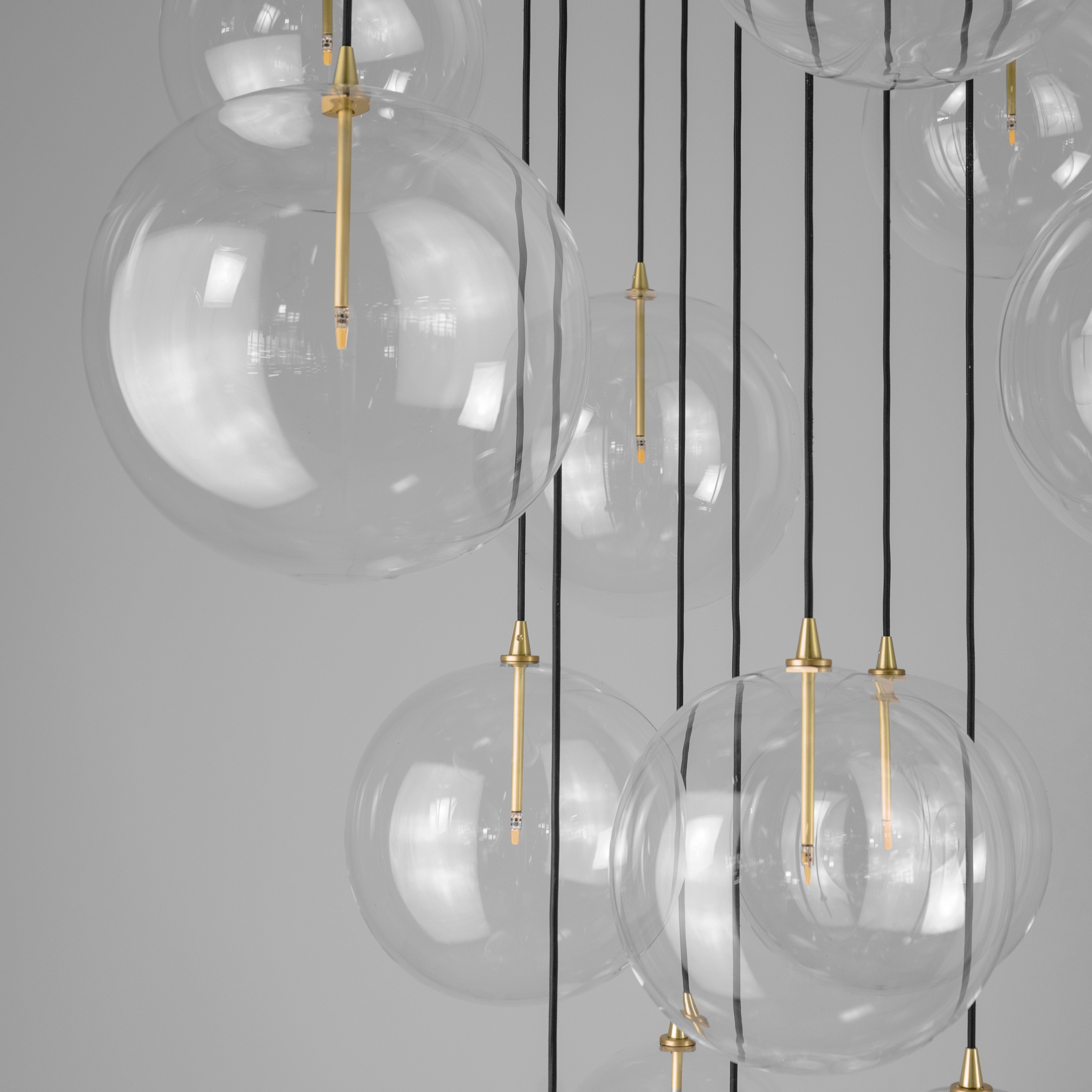 Schwung Cluster 13 Burnished Brass Transparent Globe Mix Chandelier